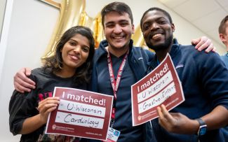 Dr. Almasry, center, celebrates the 2023 Fellowship Match with two other members of the original IMG cohort, Keshvi Chauhan, MBBS, left, and Quarshie Glover, MD, right.