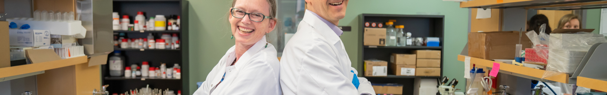 Drs. Rozalyn Anderson and Luigi Puglielli in the lab