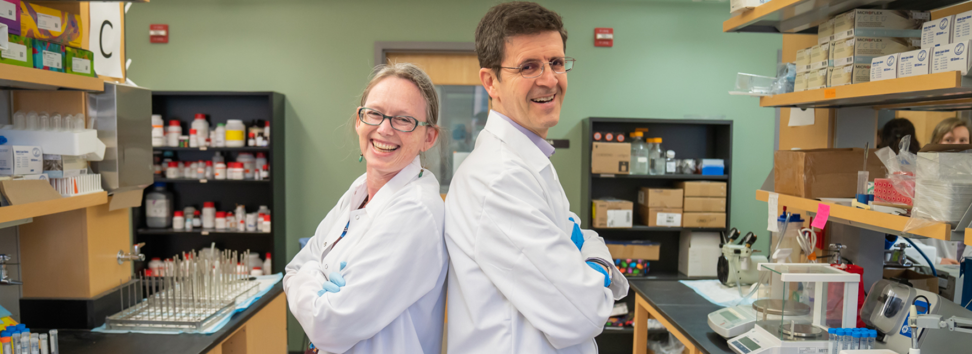 Drs. Rozalyn Anderson and Luigi Puglielli in the lab