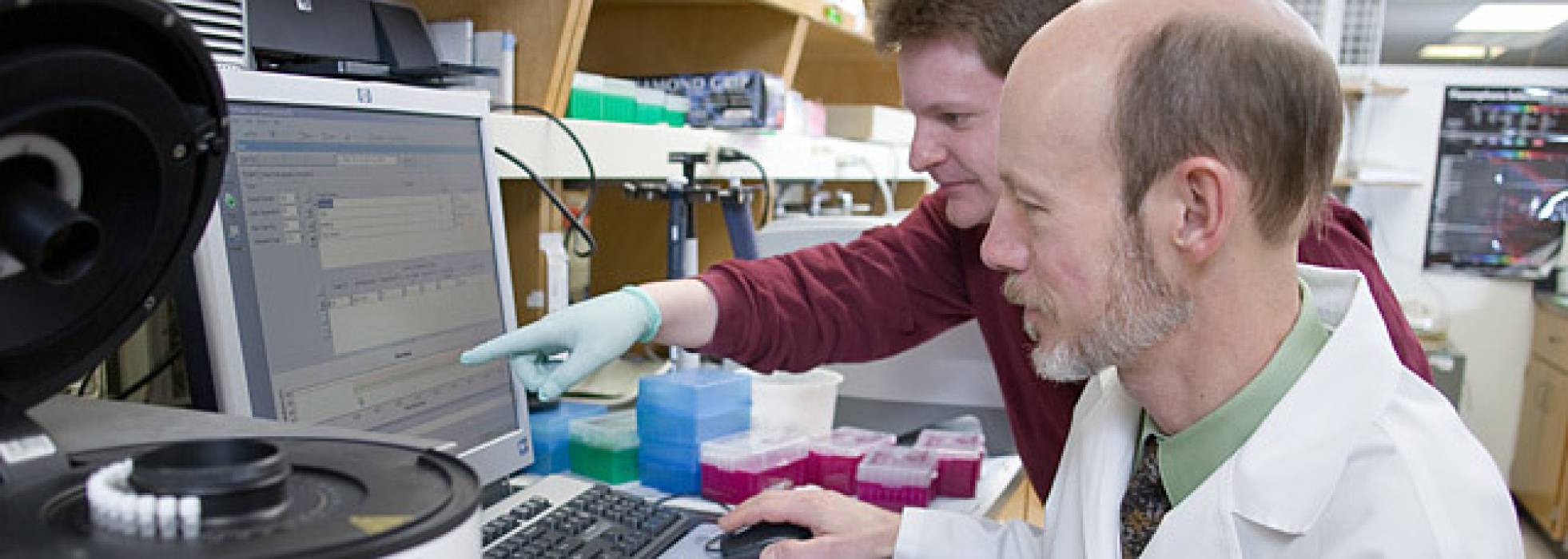 photo of Dr. Tim Kamp doing research in front of a computer