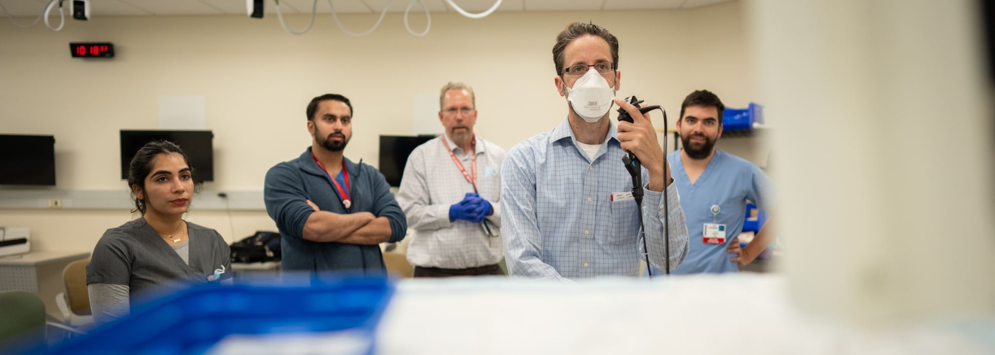 photo of fellow learning to do a bronchoscopy