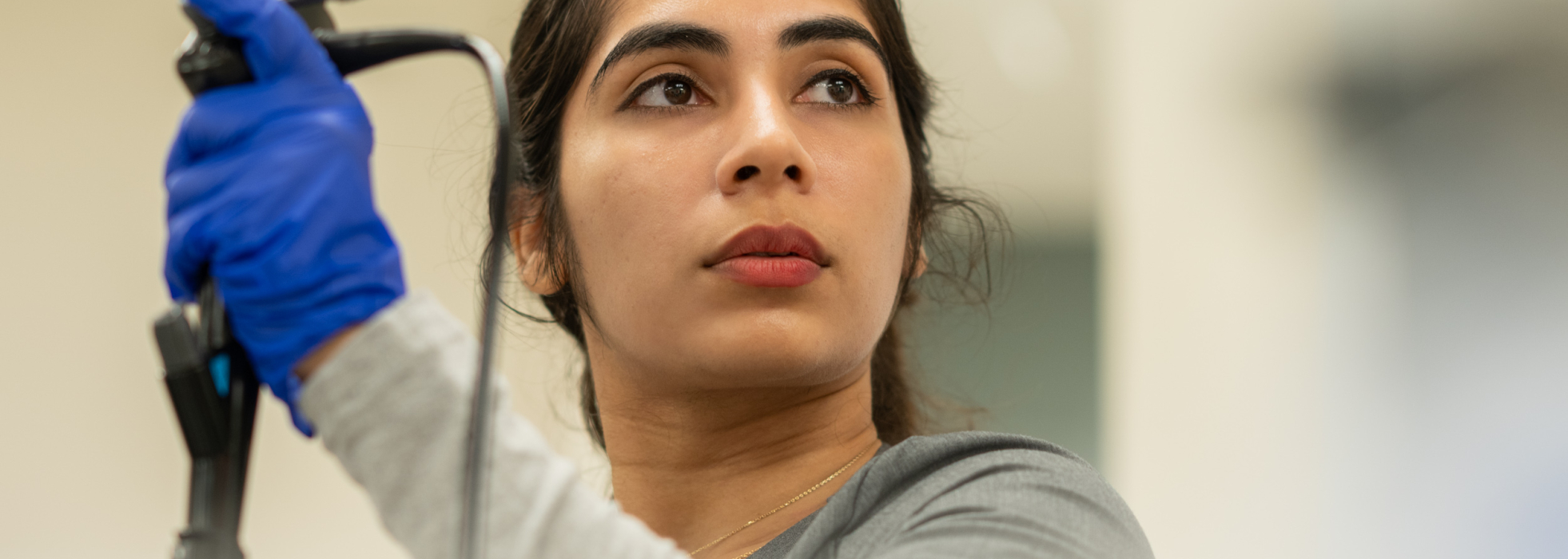 Closeup of pulmonary fellow Dr. Hajra Channa practices bronchoscopy technique