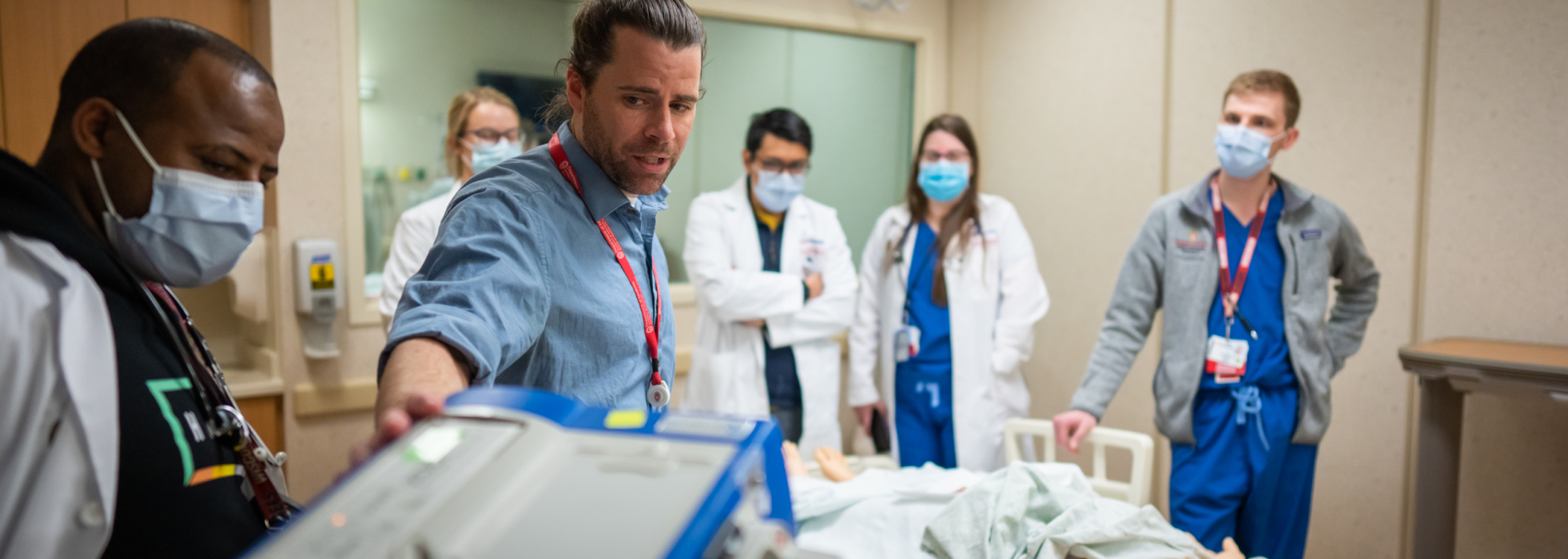 Residents learning a procedure at the UW Health Clinical Simulation Program