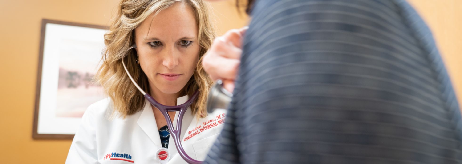 Dr. Briana Jelenc with a patient in a general internal medicine clinic