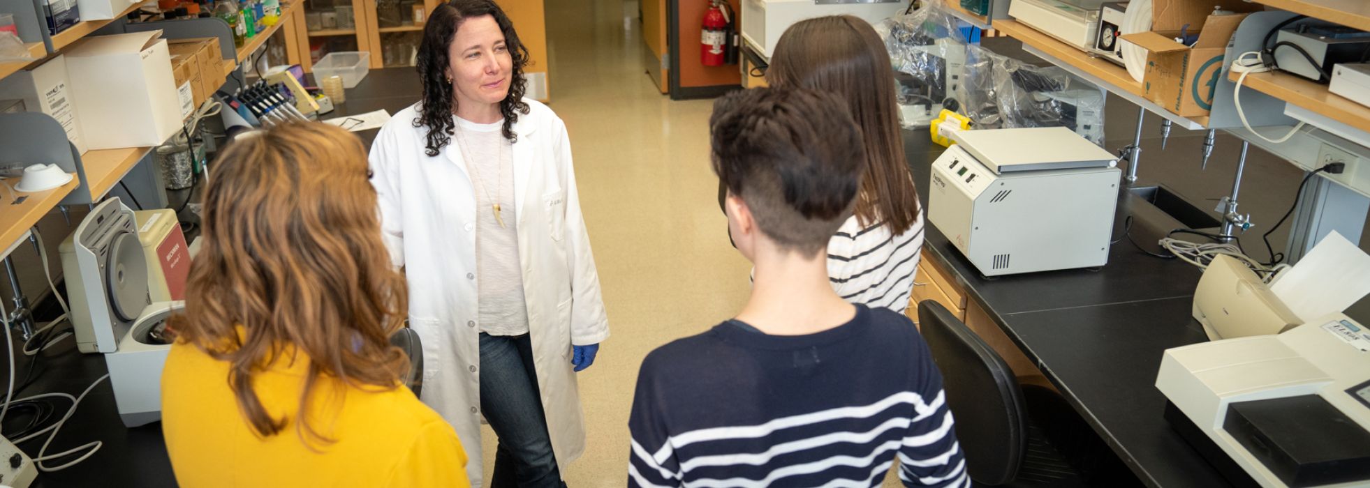 Dr. Caitlin Pepperell and team in the lab