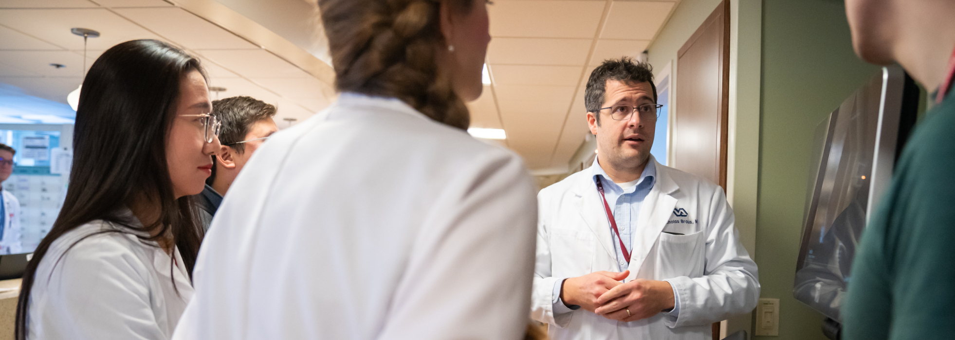 Dr. Andrew Braun with residents at the William S. Middleton Memorial Veterans Hospital