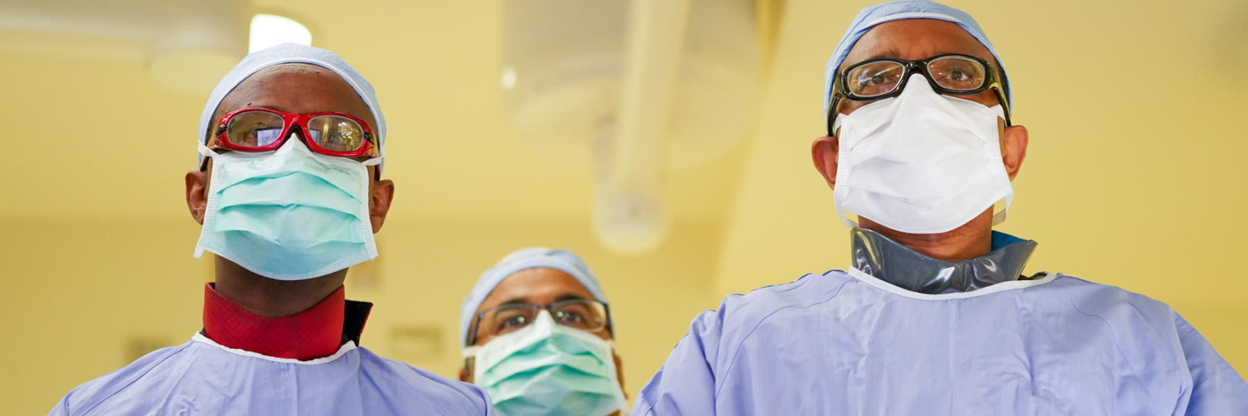 Cardiologists performing procedure