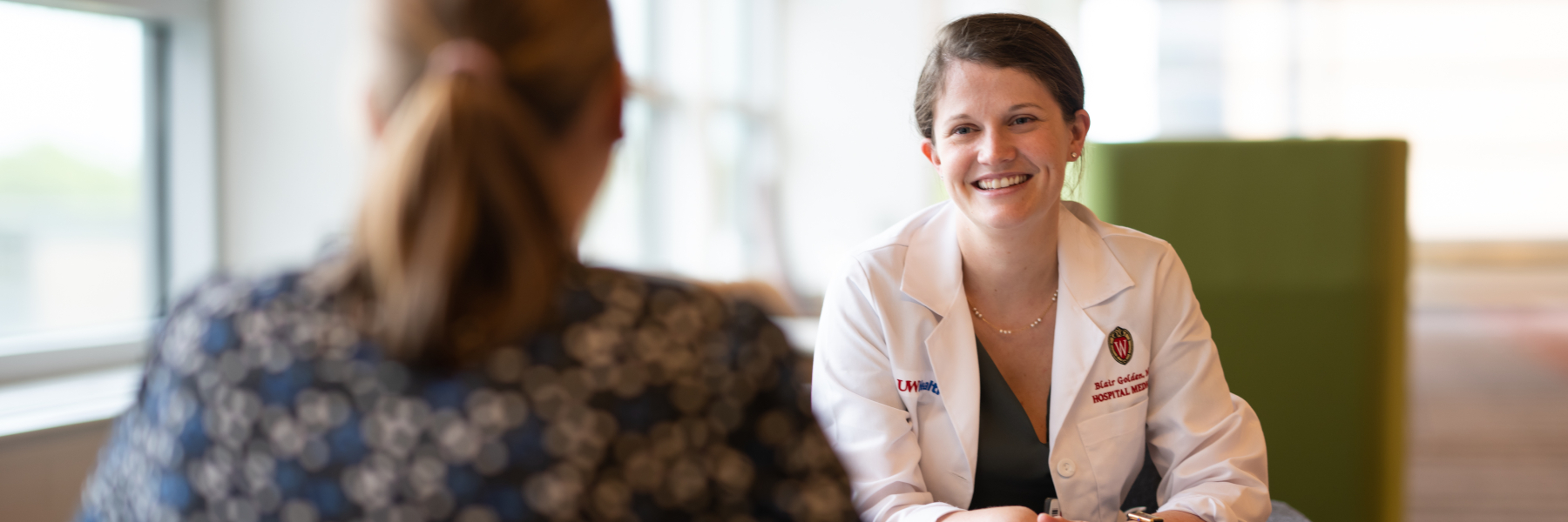 photo of Dr. Blair Golden having a face-to-face discussion 