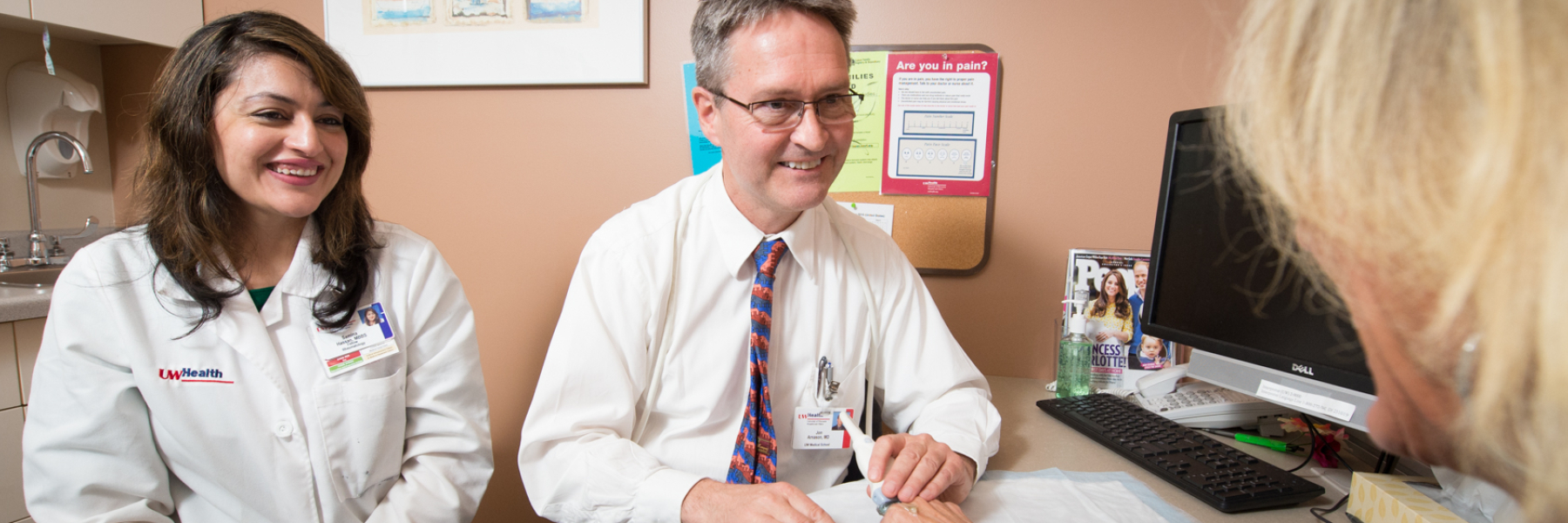 Dr. Jon Arnason and a rheumatology fellow in clinic