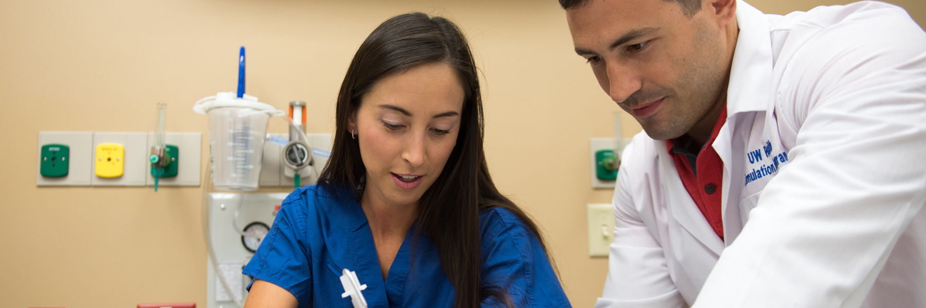Pulmonary fellow practicing intubation