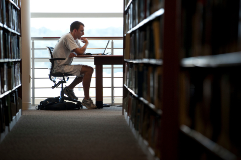 student studying at Ebling library