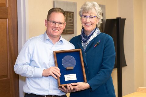 Dr. Toby Campbell receiving pallative care award