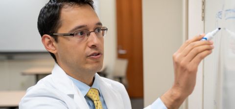 Dr. Luis Lomeli teaching in the GI fellowship