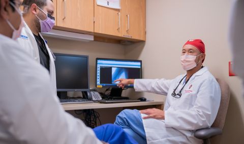 Dr. Chan discussing vascular access case