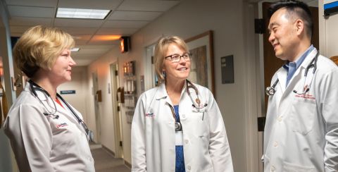 Drs. Ann Schmidt and Ernest Lee in clinic