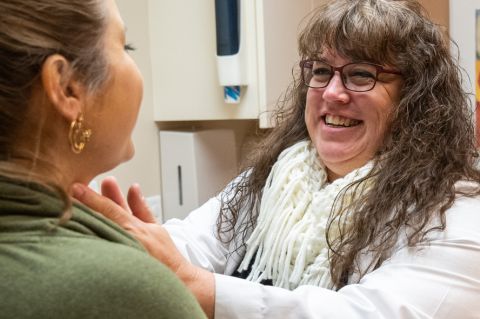 Endocrinology PA examining patient in clinic