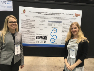 Dr Bartels and Dr Chodara at poster presentation