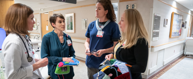 Members of the interdisciplinary Acute Care for Elders (ACE) service, pictured at UW Health University Hospital in June 2019, from left: Lauren Marshall, MS, PA-C; Stephanie Savoie, MSN, RN, AGCNS; Susanne Angileri, MPT; Magda Bertalan, MSW, CAPSW
