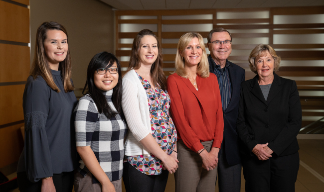 Residents Johanna Poterala, MD, Jennifer Li, MD, and Rachell Ayers, MD, are pictured with Ann Sheehy, MD, MS, and her parents Gregory Sheehy, MD, and Barbara Sheehy.