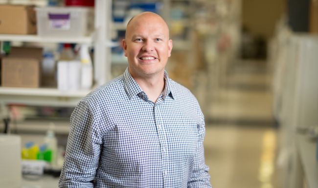 Dr. Christopher Sundberg in his lab.