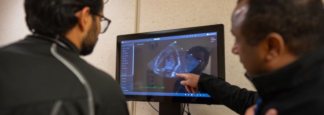 A nephrology fellow reviews a kidney scan