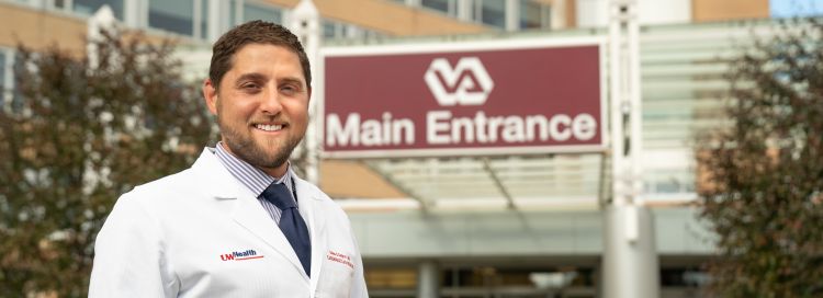 Adam Gepner in front of the VA Hospital