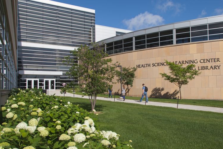Exterior photo of Health Sciences Learning Center and Ebling Library