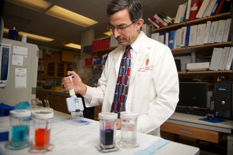 photo of Dr. Nizar Jarjour at research bench