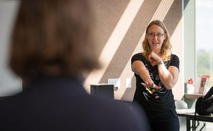 photo of Dr. Amy Zelenski demonstrating improve during resident We Talk session