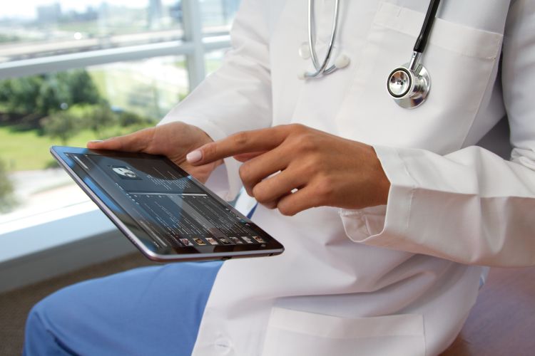 stock photo of doctor on a tablet