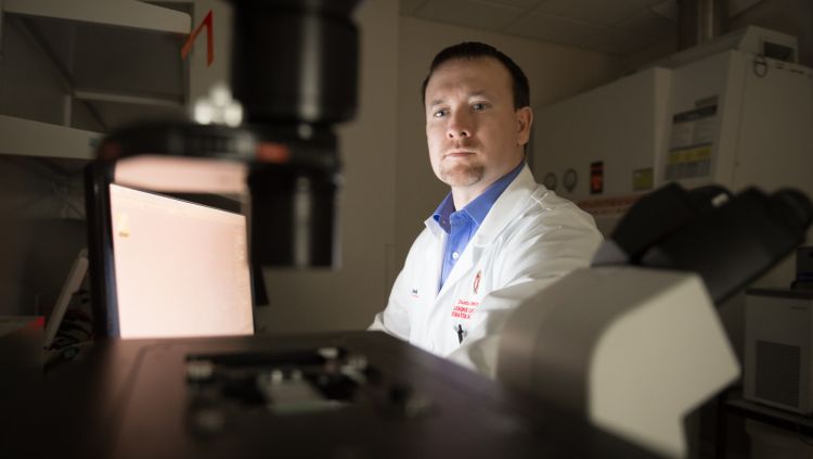 Dr. Dustin Deming in research laboratory