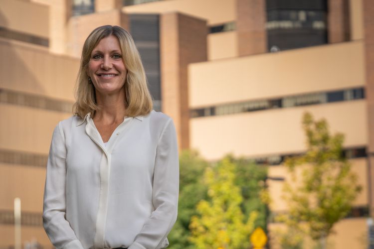 Ann Sheehy, MD, MS, poses outside UW Health.