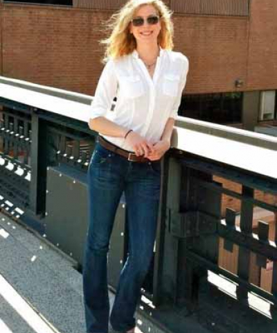Photo of Elyse Harris standing by a building