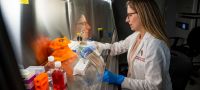 Hilary Faust, MD, MS, in the lab.