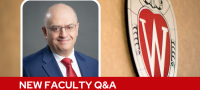 A professional headshot of Dr. Barakeh over a tan background with a Wisconsin crest, and white text on a red bar saying "New Faculty Q&A".