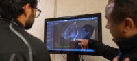 A nephrology fellow reviews a kidney scan