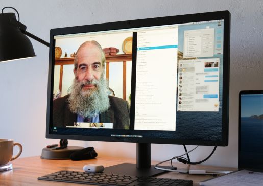 Dr. Bennett Vogelman addresses the program graduates during their online ceremony.