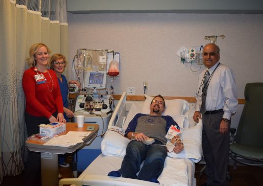 Lauren Racki, BMT patient coordinator; Jan McMannes, clinical nurse specialist with the BMT program; Ben Sanderfoot, patient and Dr. Peiman Hematti, professor, Hematology, Medical Oncology and Palliative Care.