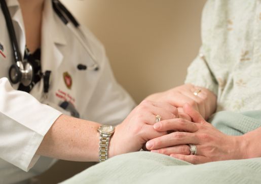 Inpatient scene with physician and patient