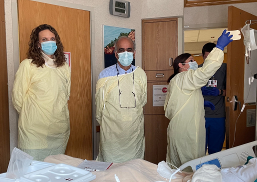 Drs. Uboha (left) and Hematti (right) with their patient, Steve Larson of Iowa City, Iowa, during his first infusion treatment. Photo was provided by the patient. 