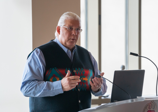 Bret Benally Thompson, MD, associate clinical professor, speaks at a public event.