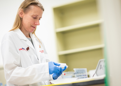 Side view of Cindy Zuleger, PhD, a scientist in Dr. Mark Albertini's lab