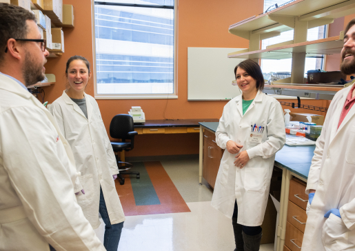 Group photo of Dr. David Kosoff and research team in the lab