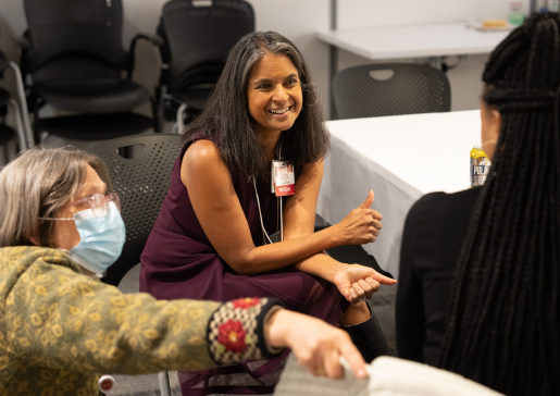 Drs. Betsy Trowbridge, Shobina Chheda and Chinenye Odo talk at a department networking event for underrepresented faculty, learners, and staff