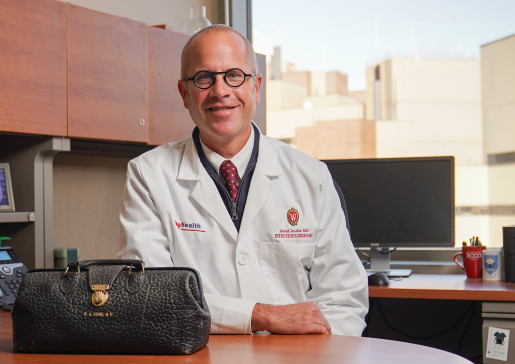 Photo of David Andes, MD, at his desk