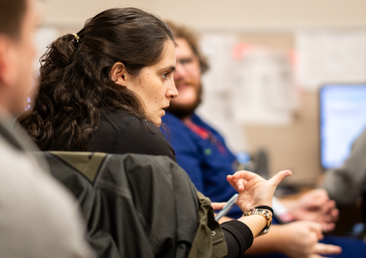 Residents Brandon Leding, MD, and Emily Schmitz, MD, at an inpatient rounds discussion