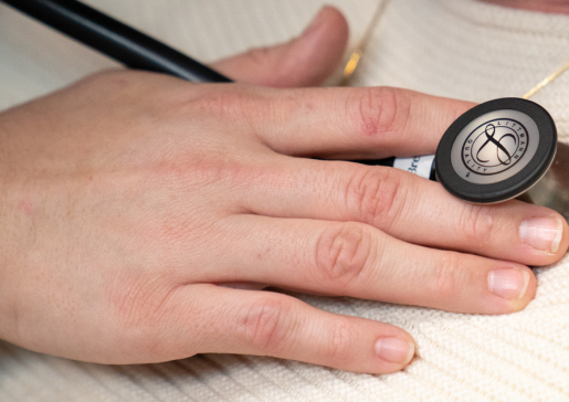 Physician and patient with stethoscope