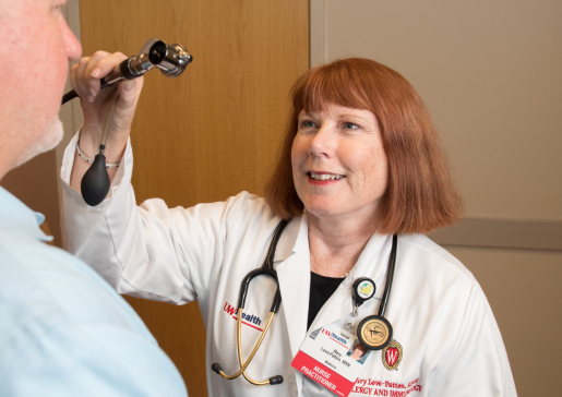 Mary Love-Patten, NP, does an exam in the clinic