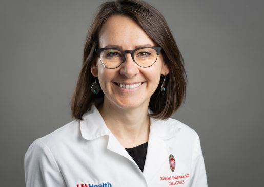 Dr. Elizabeth Chapman in her white coat.