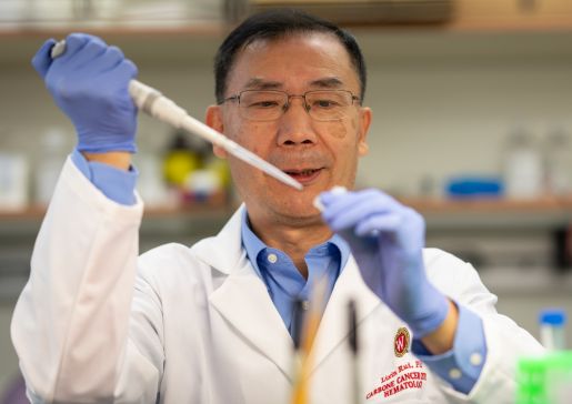 Dr. Lixin Rui in his lab